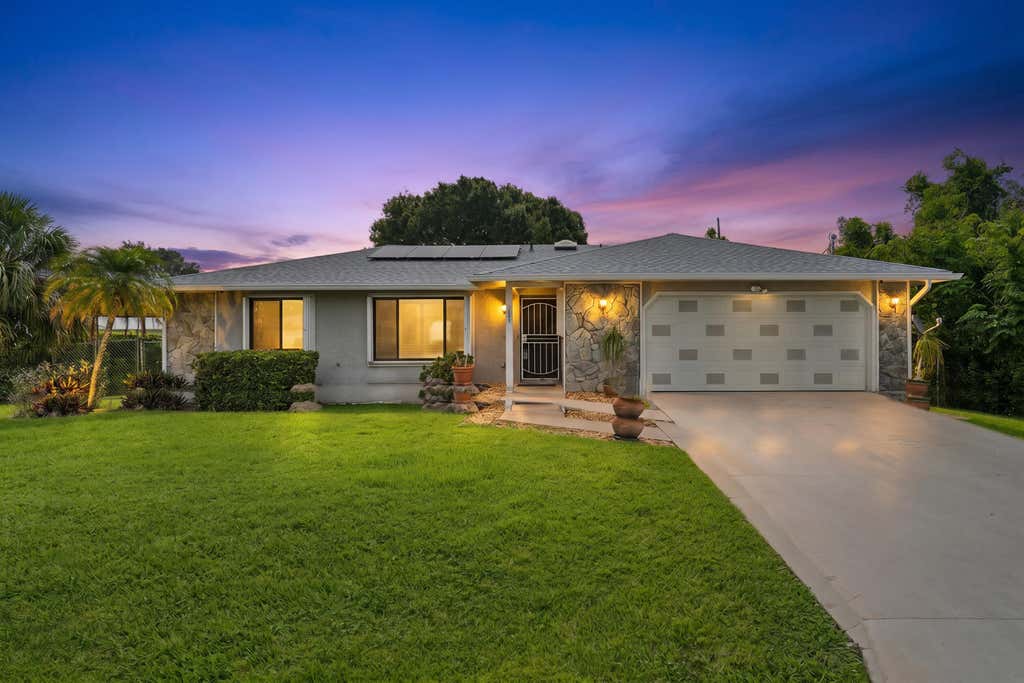 Photo of 1701 SW Ardmore Street, Port Saint Lucie, FL 34953 (MLS # B26044045)