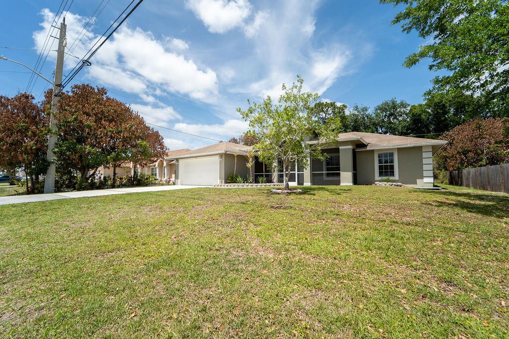 Photo of 517 SW Paar Drive, Port Saint Lucie, FL 34953 (MLS # B26015247)