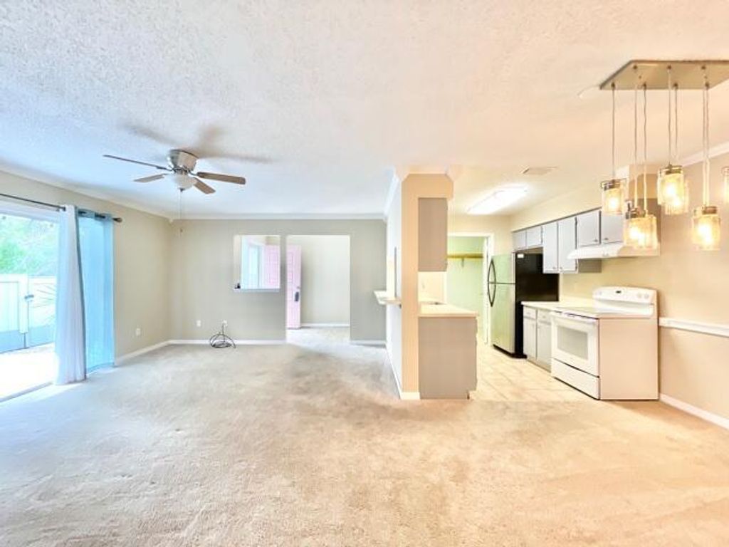 Photo of 3905 NW Cinnamon Tree Circle, Jensen Beach, FL 34957 (MLS # R10741401)