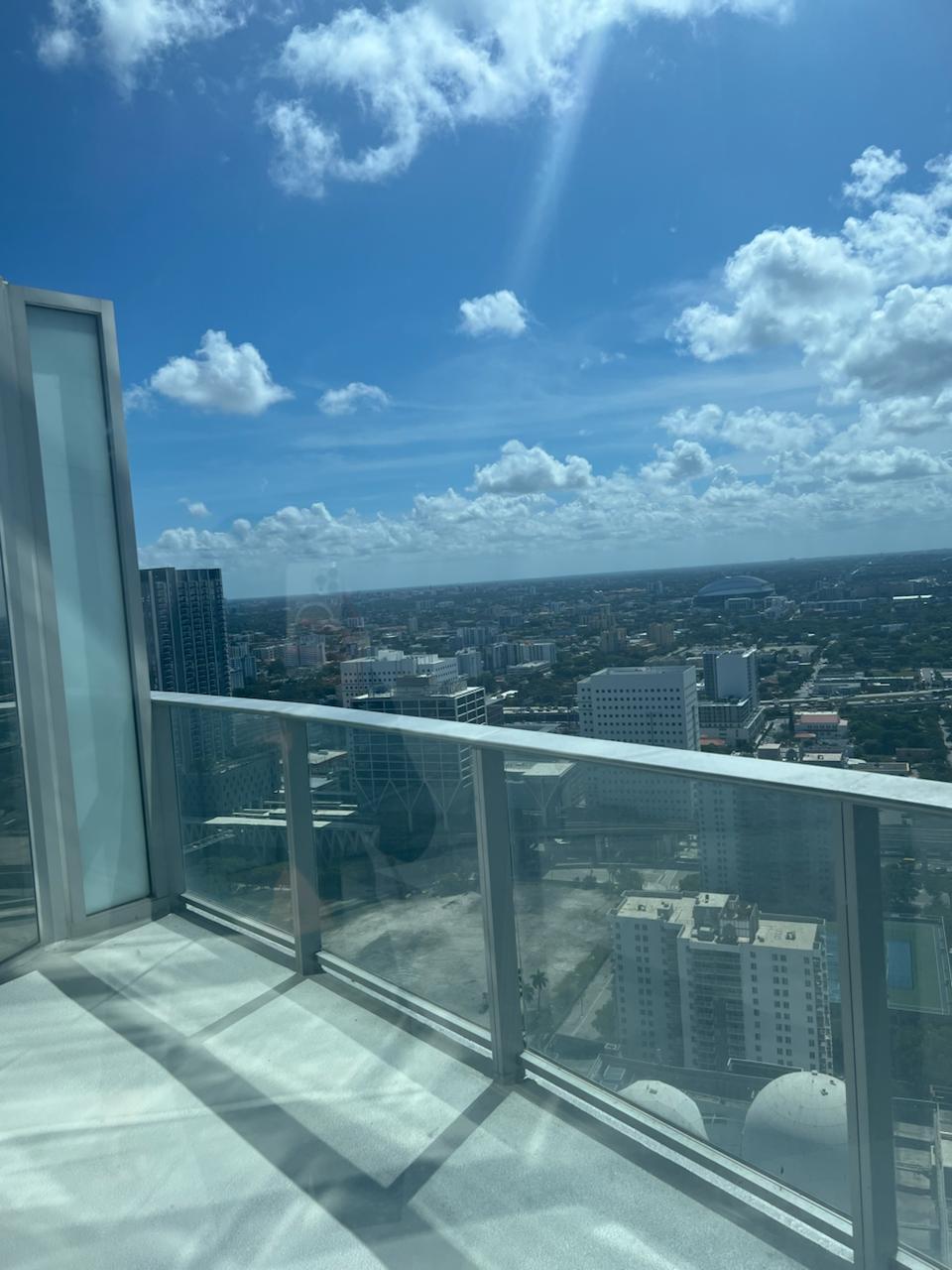 Best priced 1BD + Den at Paramount Miami Worldcenter! Freshly painted, professionally cleaned, and ready to rent. Private elevator opens to your foyer. Two balconies off the bedroom and living room. Den can convert to guest room. Enjoy white porcelain floors, Quartz island with cooktop, built-in fridge, wall oven, and floor-to-ceiling impact windows. Full-size washer/dryer in unit. Resort-style amenities include pools, cabanas, theater, gym with boxing ring, soccer field, spa, kids' room, and more. Valet and parking included. Luxury living at its finest--must see!