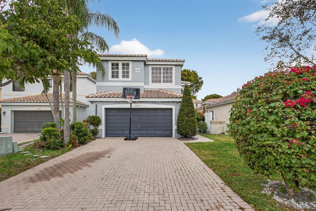 Photo of 3847 NW 62nd Street, Coconut Creek, FL 33073 (MLS # R11160704)