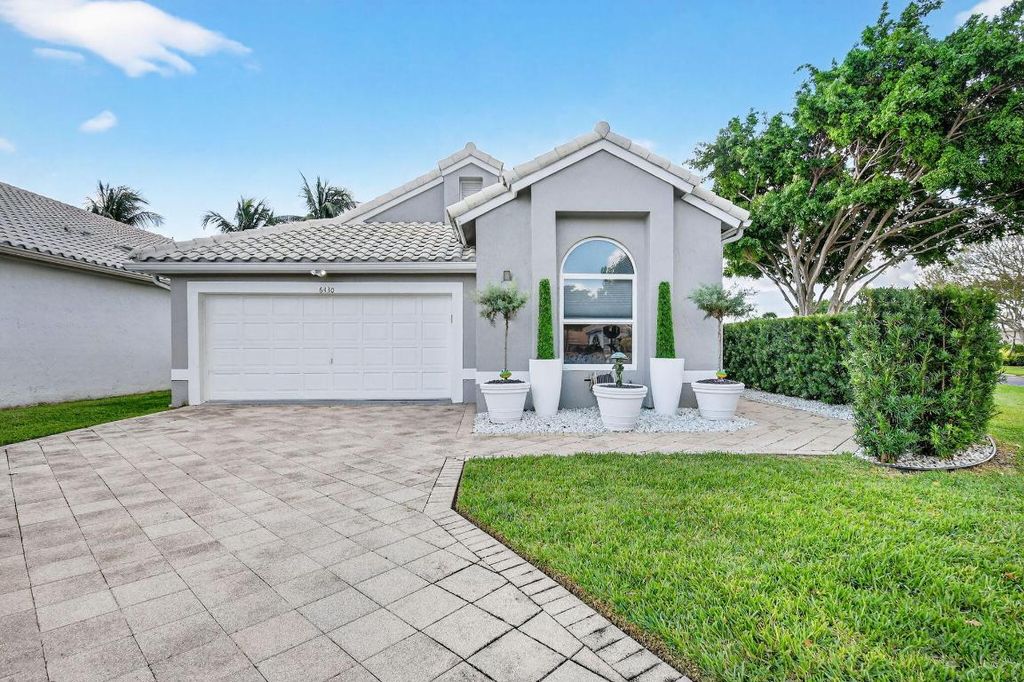 Photo of 6430 Three Lakes Lane, Boynton Beach, FL 33437 (MLS # R11133410)