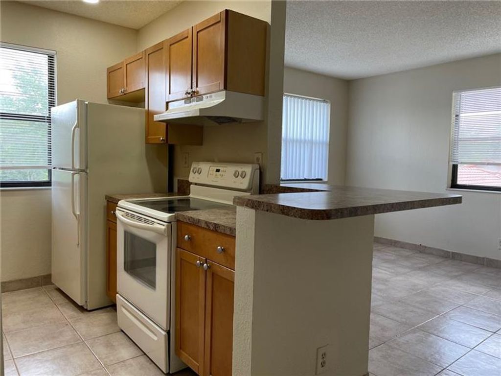 Photo of 11628 NW 26th Court #5, Coral Springs, FL 33065 (MLS # B26011050)