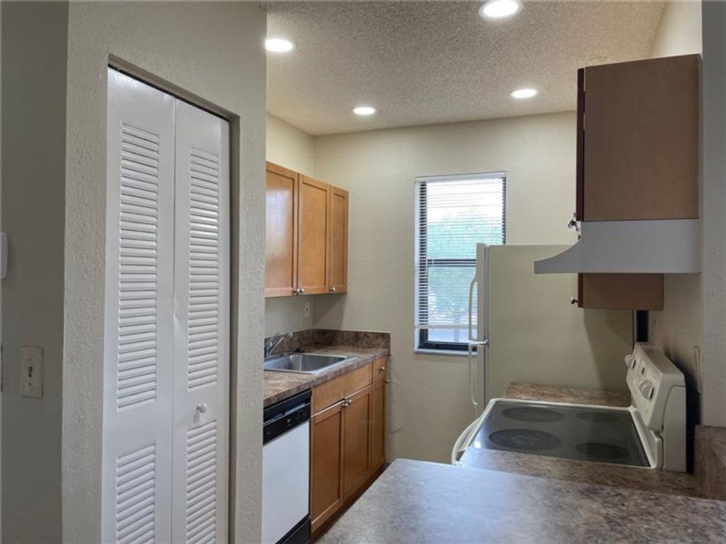 Photo of 11628 NW 26th Court #5, Coral Springs, FL 33065 (MLS # B26011050)