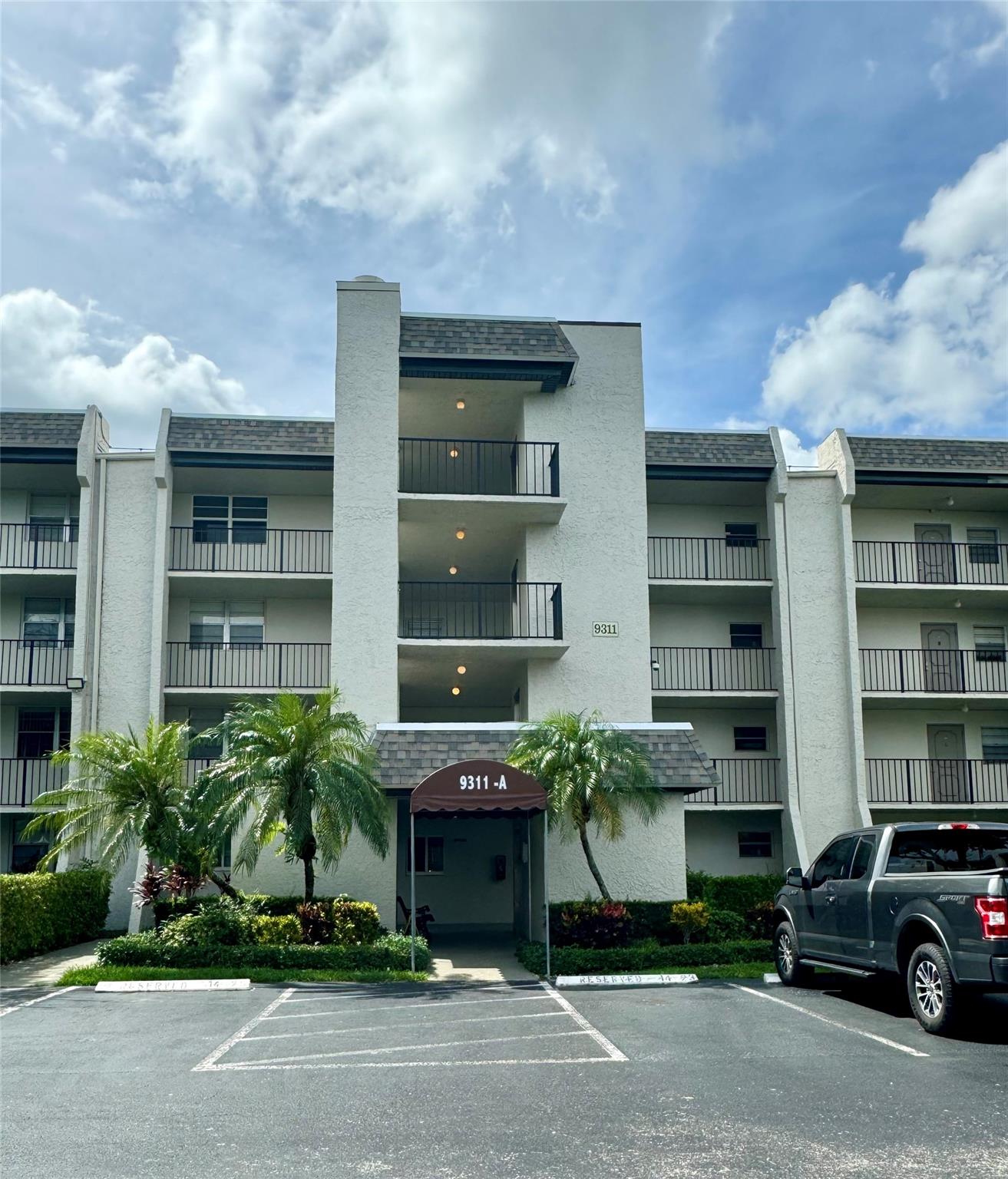 Beautiful bright and airy unit overlooking the lake and pool/clubhouse area. Enjoy the wonderful amenities of Pine Island Ridge Country Club including access to the tennis courts, basketball courts, shuffleboard, park and walking paths. This unit has been freshly painted and features new laminate floors, new light fixtures and ceiling fans, new water heater, new closet doors and a recently refinished tub. Unit also has small storage area in storage room. Balcony is enclosed with screened windows so that you can enjoy your views year round. Come enjoy this quiet country club community that is central to the best that Davie has to offer!
