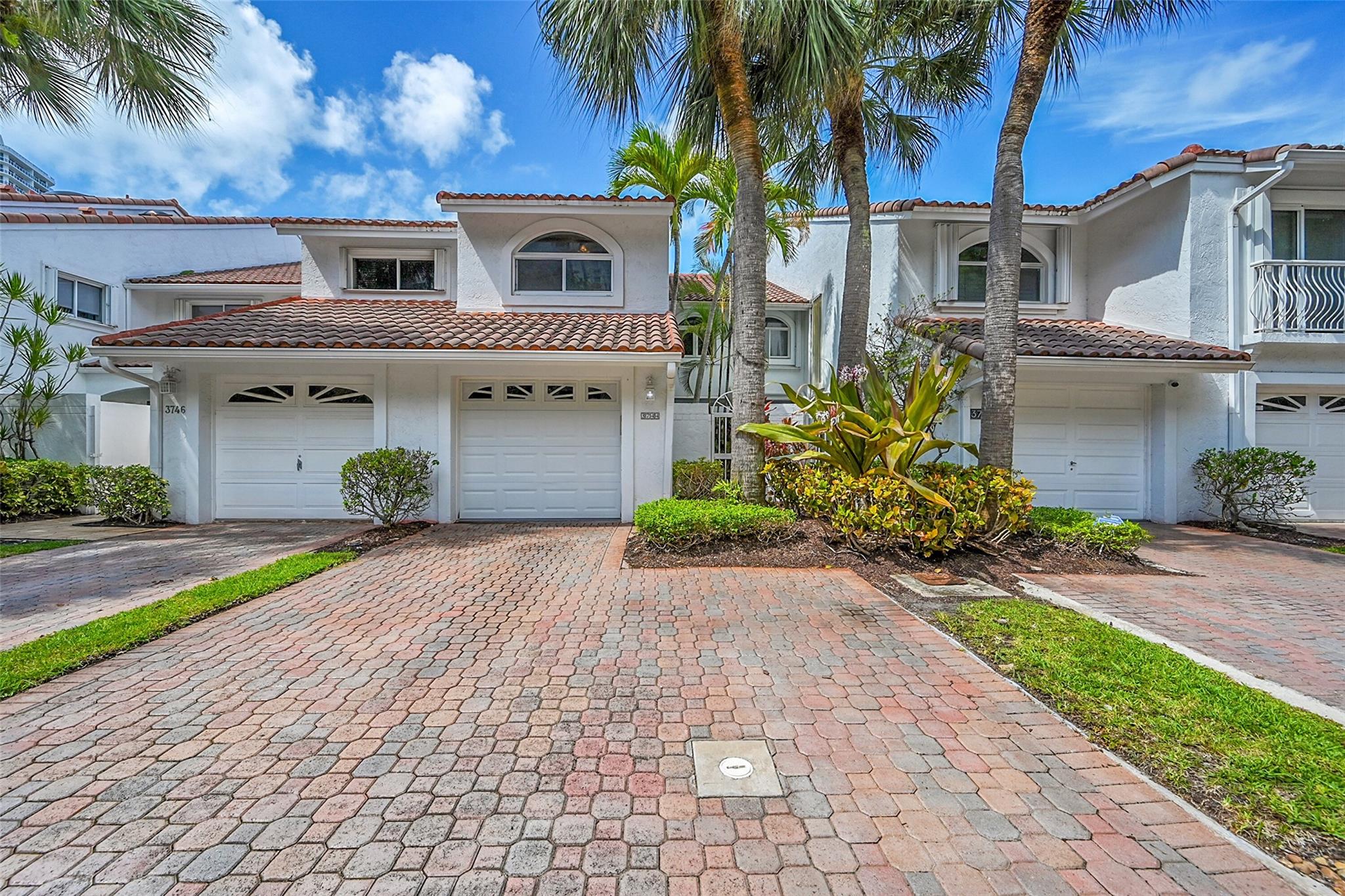 Don’t miss the chance to own this beautifully maintained townhome just steps from the Waterways Marina and Intracoastal. This spacious 3 bed, 2.5 bath residence offers nearly 1,900 sq ft of living space featuring vaulted ceilings, an indoor laundry room w/sink and 1-car garage with 2 outdoor parking spaces. A sub-zero fridge, crown molding, impact doors & windows, fresh interior paint, ample storage w/ closet systems and more! What truly sets this home apart is the exceptional water view enjoyed from your private patio—perfect for relaxing or entertaining. Situated in a boutique community of only 79 homes, residents enjoy 24-hour manned security, a saltwater community pool & proximity to premier shopping, dining, top-rated schools & houses of worship. A true gem in the heart of Aventura!