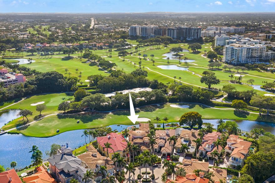 Set within the prestigious, double-gated enclave of Addison Estates, and located directly on the grounds of The Boca Raton, this architectural marvel commands sweeping golf course and tranquil lake views in one of South Florida's most exclusive settings.

Encompassing 8,365 square feet of living space and 9,401 square feet in total, the residence is defined by soaring ceilings, voluminous entertaining areas, and extraordinary architectural detail throughout. A dramatic third-story rotunda crowns the estate, where stained glass at its apex casts luminous color and light, creating a breathtaking focal point that speaks to the home's artistry and grandeur. The main level unfolds with a layout designed for both elegant entertaining and everyday comfort. The primary bedroom suite is privately situated on the first floor, offering convenience and scale, alongside a guest bedroom suite ideal for visiting family or extended stays. A refined office provides a distinguished work environment. The formal dining room, complemented by a built in bar, sets the stage for elevated gatherings, while a wine cellar adds a sophisticated touch for collectors. The double height living room impresses with dramatic volume and natural light, reinforcing the residence's grand architectural presence.

Upstairs, beautifully appointed guest bedrooms are all en suite, each offering privacy and comfort. Two additional living rooms provide flexible lounge spaces for media, relaxation, or family living. Second floor terraces extend outward, capturing panoramic golf course and lake views while enhancing the seamless indoor outdoor lifestyle that defines this estate.

Outdoors, resort style living takes center stage. Sweeping fairway vistas frame the pool and tranquil entertaining areas, surrounded by lush landscaping that enhances privacy and serenity. The setting evokes the ambiance of a private resort within one of Boca Raton's most exclusive communities. Additional features include two laundry rooms and a two car garage, blending practicality with impressive scale.

Offered as an exceptional opportunity with tremendous upside, the residence presents remarkable potential to customize and elevate to your personal vision through modern refinement or bespoke luxury finishes.

Grand in every sense, this is a residence defined by architecture, setting, and possibility, an irreplaceable offering within Addison Estates and the greater Boca Raton luxury landscape.