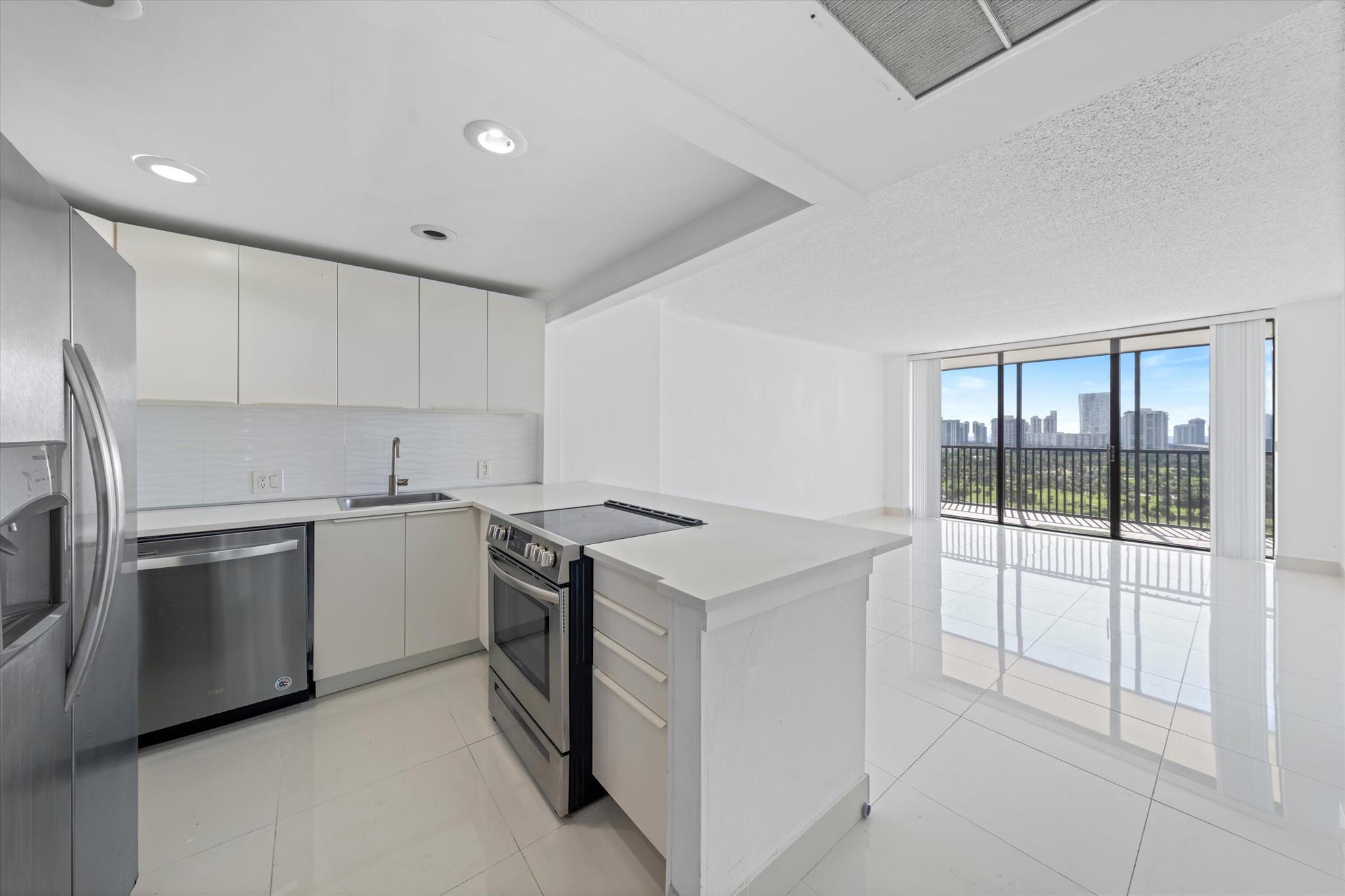 Views for days!  This 19th floor condo in beautiful Aventura, FL overlooks the golf course and views all the way to the ocean.  1 bedroom and 1.5 bath, remodeled with white ceramic tile gives that clean bright open feel straight through to the balcony sliding glass doors with the panoramic view.  Complex amenities are all there; Pool, hot tub, fitness center, lobby, and meeting room. This price, for these views, in this location - is everything.  Come see for yourself.