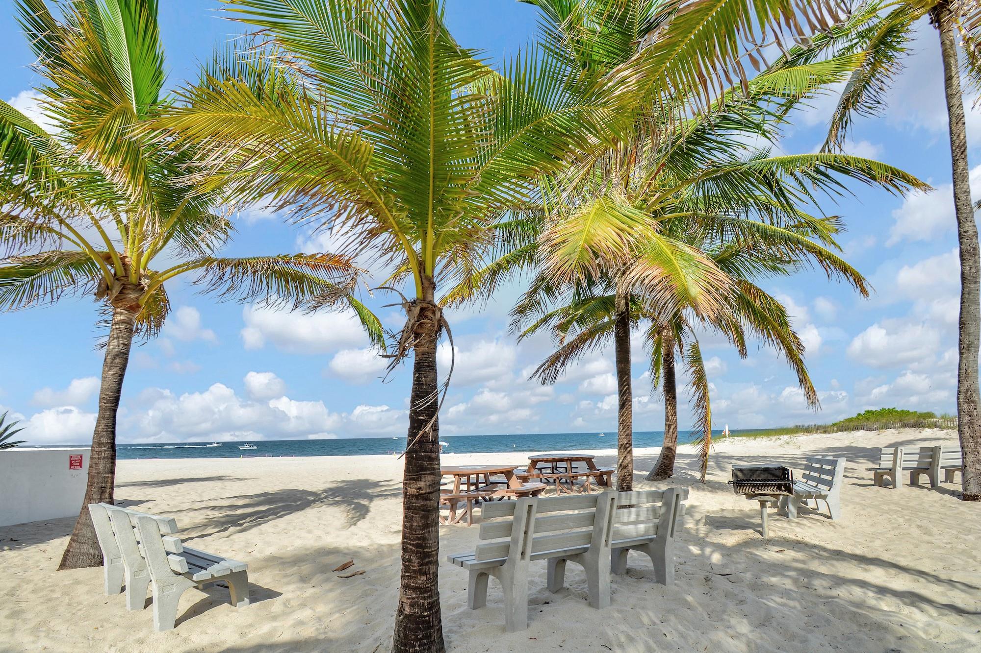LIVE AT THE BEACH! Annual Rental. Available Sept. 10. Deepwater single family home. 1 block from the sand. 1950's style. Wide-Open Floor Plan. Florida living the way it used to be. Quiet Private Road. Huge backyard, pool, big screened porch and newer private dock. No fixed bridges to the Ocean. Spend your afternoons at the vast, locked private beach at the end of the street, with palm grove, shelters, and barbecue grills. Home is on a 10,000 plus square foot lot with 70 feet on deepwater. Tile floors. Washer and Dryer. Each room is individually cooled by a quiet, efficient mini-split system. This home is perfect for the beach loving boater.