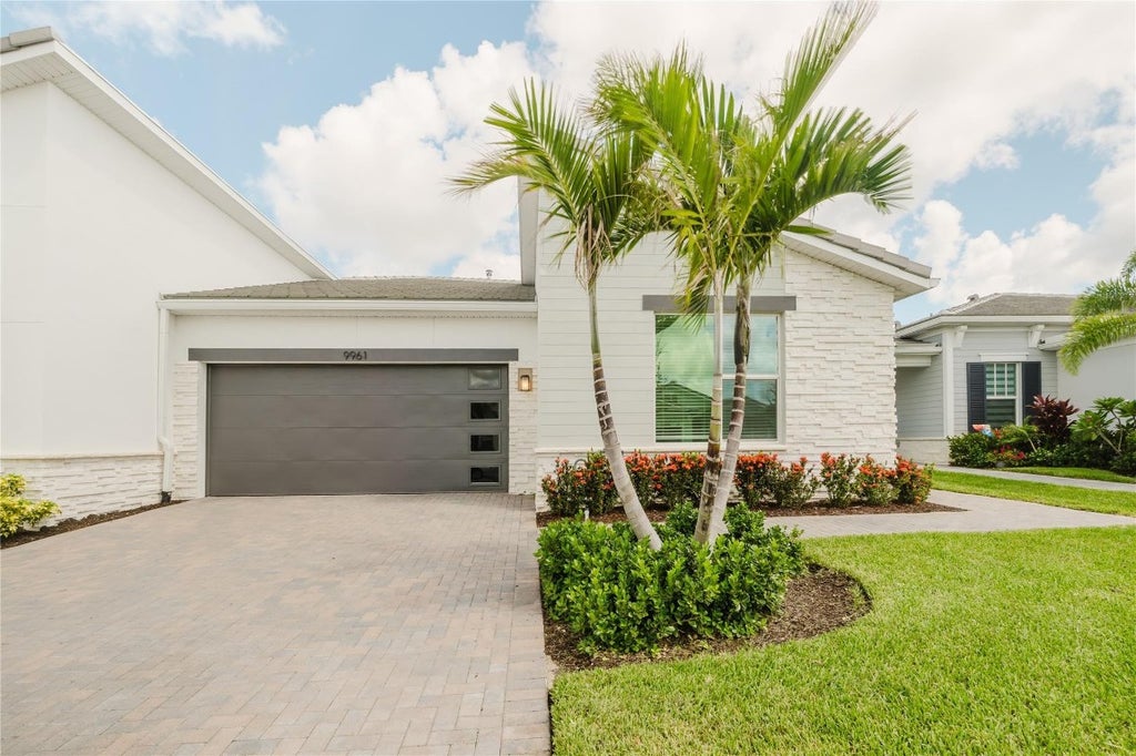 Photo of 9961 SW Isabelline Drive, Port Saint Lucie, FL 34987 (MLS # F10512966)