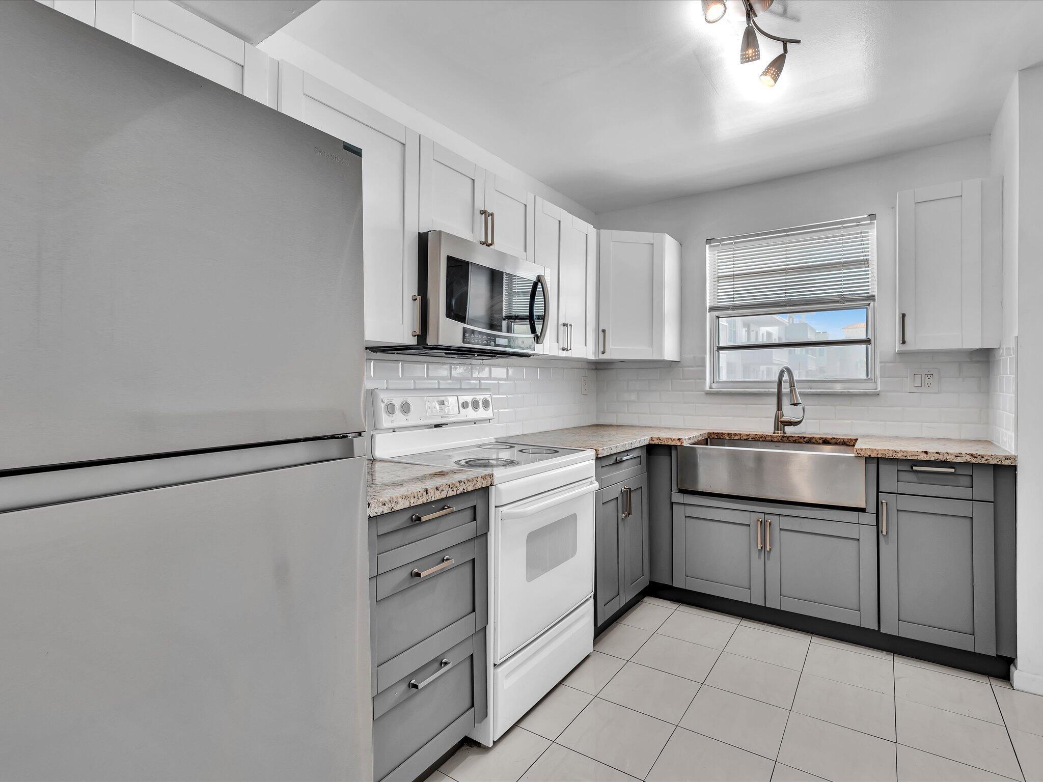 Enjoy the Florida lifestyle in Golden Surf Towers, an Intracoastal waterfront community. Live in this bright, beautiful, well-maintained and move-in ready home. Featuring a large balcony with a partial water view. Updated kitchen has Shaker cabinets, granite counters, and apron sink. The spacious primary bedroom has two walk-in closets and a private bath with window. Buyer will take advantage of the prior assessments being paid-in-full at closing by the seller. Cable and high-speed internet included in the HOA. Shared laundry and storage on the same floor. Highly desirable location 1.3 miles to the beach. Minutes from beaches, shops, dining, entertainment, airports, and downtown.