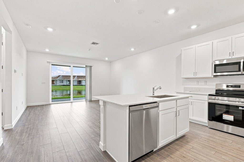 Photo of 3718 Harborside Avenue, Fort Pierce, FL 34946 (MLS # B26069211)