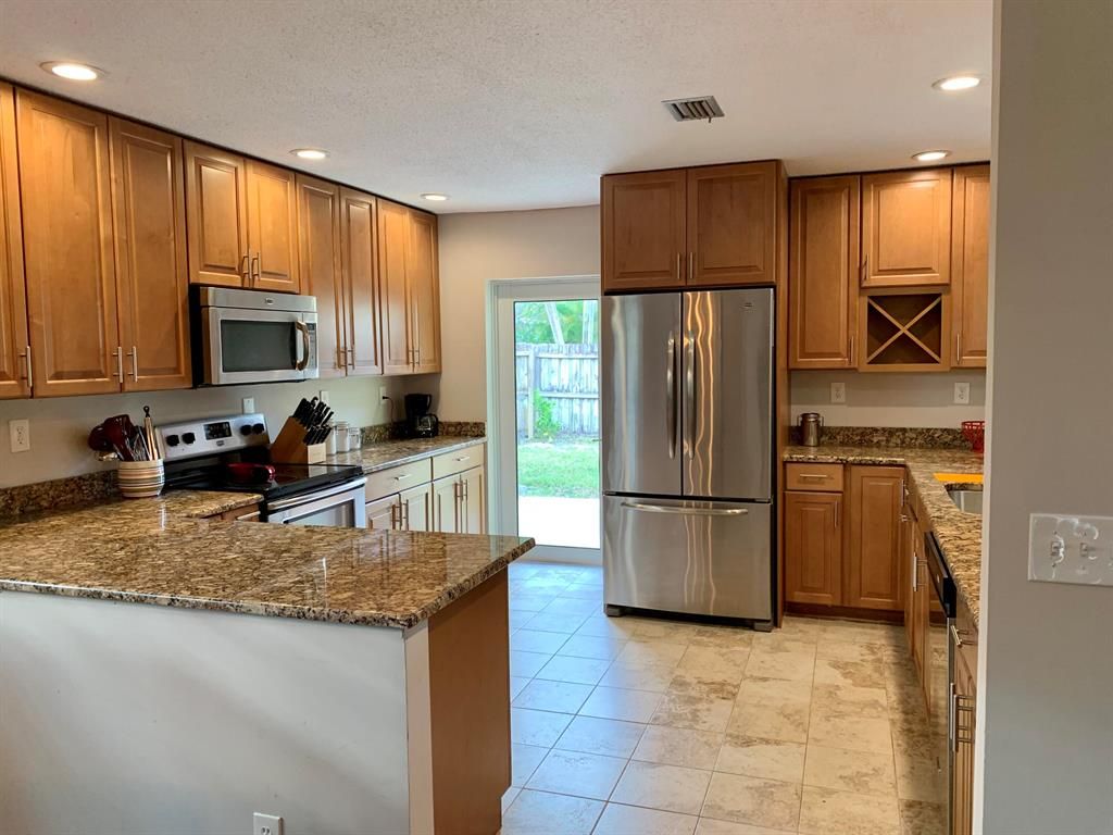 Photo of 105 Norwood Road, Jupiter, FL 33469 (MLS # R10876980)