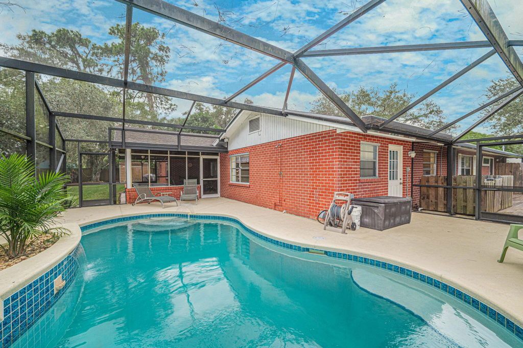 Photo of 4885 River Oak Lane, Fort Pierce, FL 34981 (MLS # R10971108)