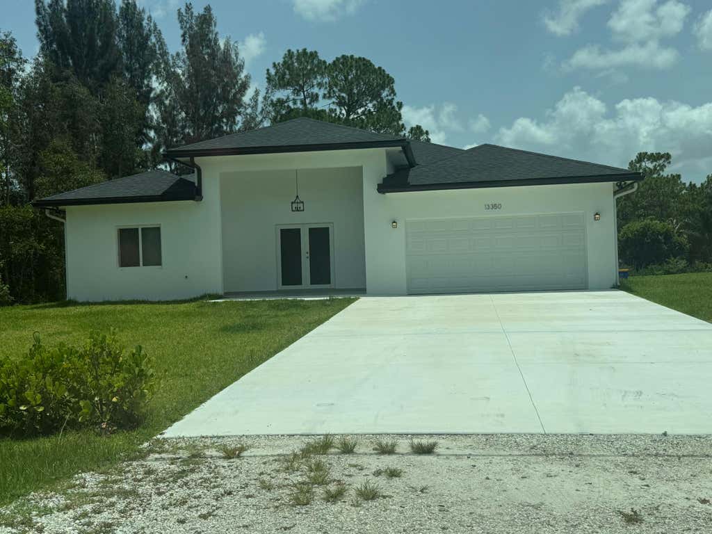 Photo of 13350 61ST Lane N, The Acreage, FL 33412 (MLS # B26054331)