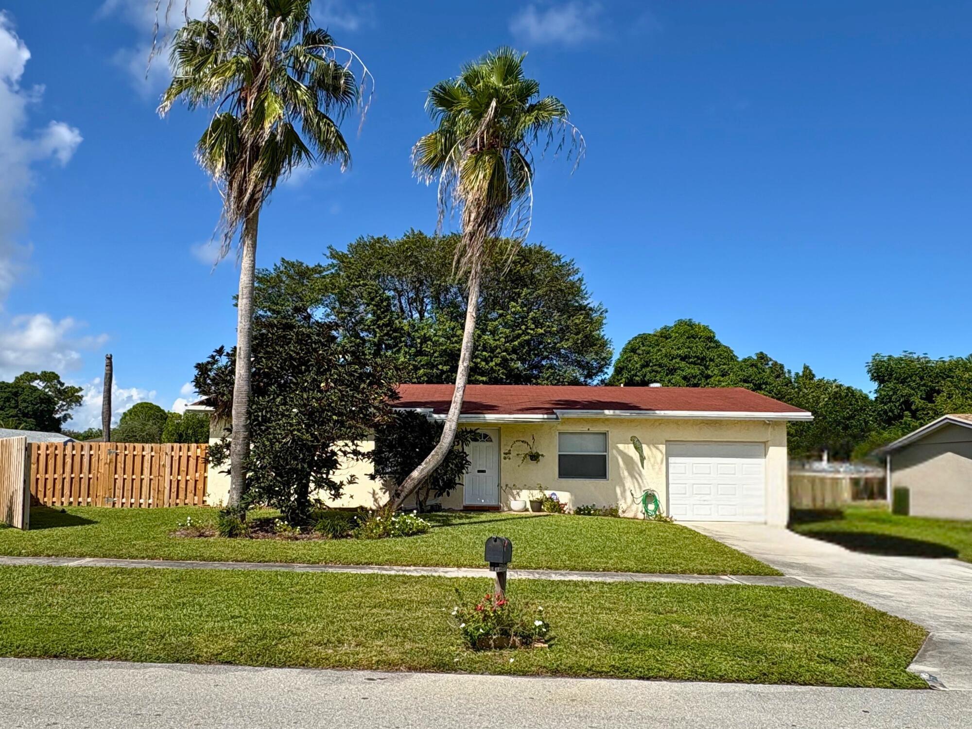 Located in the desirable Delray Shores neighborhood, this beautifully maintained single-family home on a large corner lot offers 3 bedrooms and 2 bathrooms in a bright, open one-story layout. The home is offered unfurnished and features neutral finishes, ceramic tile flooring throughout, and central A/C. Enjoy a spacious living and dining area, large screened-in patio, and a fully fenced backyard--ideal for entertaining, relaxing, or pets. Additional features include a one-car garage and a laundry area with hookups (washer and dryer not included).Conveniently positioned just west of I-95, this residence is minutes from downtown Delray Beach, shopping, dining, schools, and parks. Lawn care and pest control are included.