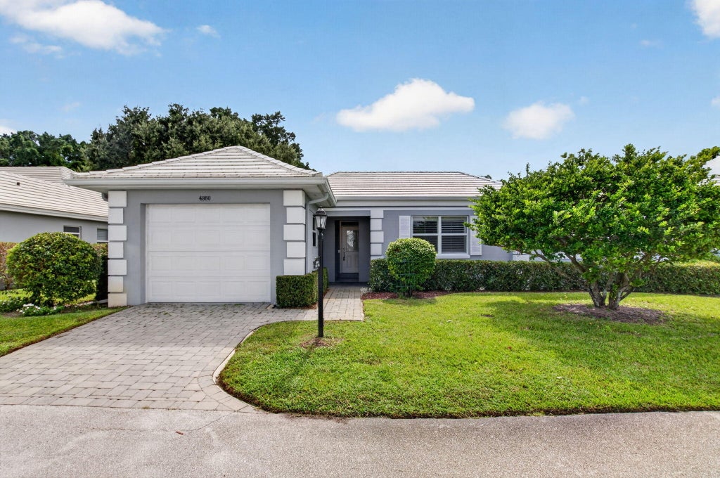 Photo of 4860 S LAKE Drive, Boynton Beach, FL 33436 (MLS # B26086538)
