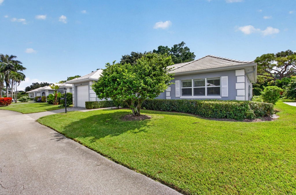 Photo of 4860 S LAKE Drive, Boynton Beach, FL 33436 (MLS # B26086538)