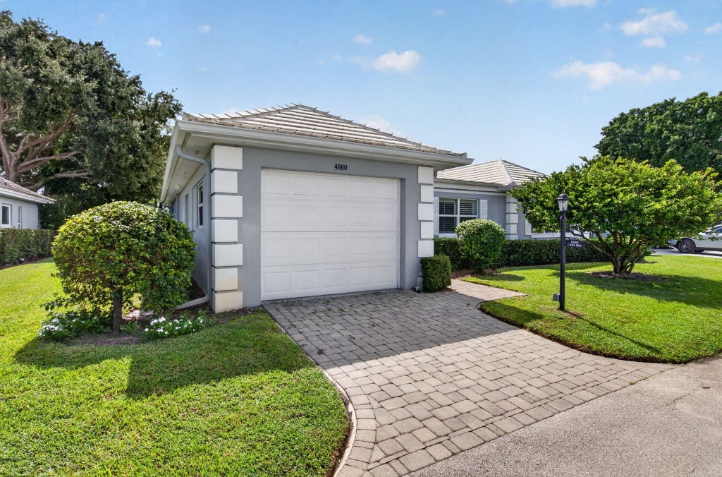 Photo of 4860 S LAKE Drive, Boynton Beach, FL 33436 (MLS # B26086538)