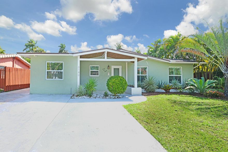 This Oakland Park single family home is a beautiful mix of classic retro and modern.  Stunning kitchen with all the custom details you would want and more.   Washer/Dryer in the home.   Large open tiled floorplan that has access to an oversized screened/glassed patio and then to a lushly landscaped tiered backyard. With access for kayaking or canoeing, no ocean access, this gives you a sense of living in your own retreat.   Water up to $50. /month included, Electric up to $75./month included.  Cable and Wifi are tenants full responsibility.  Landscaping included.  Non smokers only, RentSpree report must accompany offers.   Small pet considered with deposit/refundable.  Tesla hookup available but tenant pays for universal if required.   675 credit score minimum.