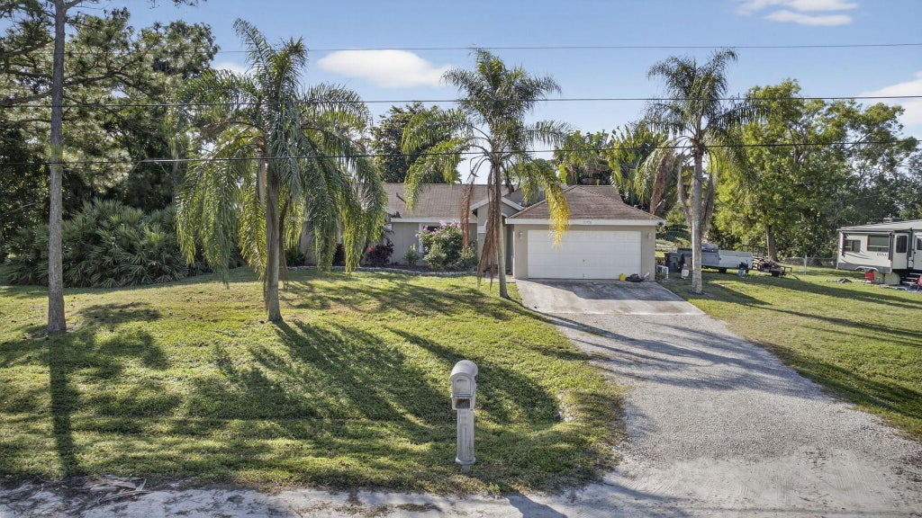 Photo of 14196 89th Place N, The Acreage, FL 33470 (MLS # R11151344)