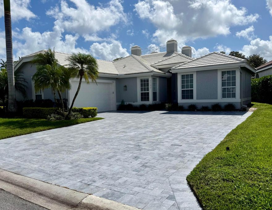 Completely renovated, move-in ready contemporary home in Victoria Isles at Woodfield Country Club! This stunning 4-bedroom, 3-bath residence features elegant porcelain floors, high ceilings, and a bright open layout. The designer kitchen includes premium Wolf appliances and a built-in Sub-Zero refrigerator, with beautifully updated bathrooms and modern finishes throughout. Hurricane impact windows, extra-high sliders, new A/C, and a new water heater provide comfort and peace of mind. The private backyard offers new turf, lush landscaping, and a covered patio with electric awning--perfect for entertaining. A newly expanded driveway and air-conditioned garage with added storage complete this meticulously upgraded home in one of Boca Raton's premier country club communities.