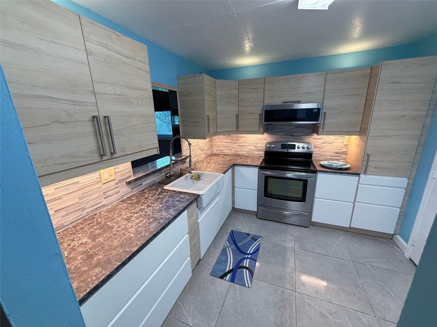 Spacious 2-bedroom, 2-bathroom corner unit on the 4th floor in Polynesian Gardens! This bright and airy unit features extra windows in the dining and living rooms—unique to corner units. Enjoy an upgraded kitchen, hurricane-impact and heat-resistant windows, and plenty of natural light. Includes 1 assigned parking spot with plenty of guest parking and laundry facilities conveniently located on each floor. Located in a quiet, family-friendly community with a pool and newly remolded gym. Just minutes from major highways, restaurants, and shops. A great place to call home!