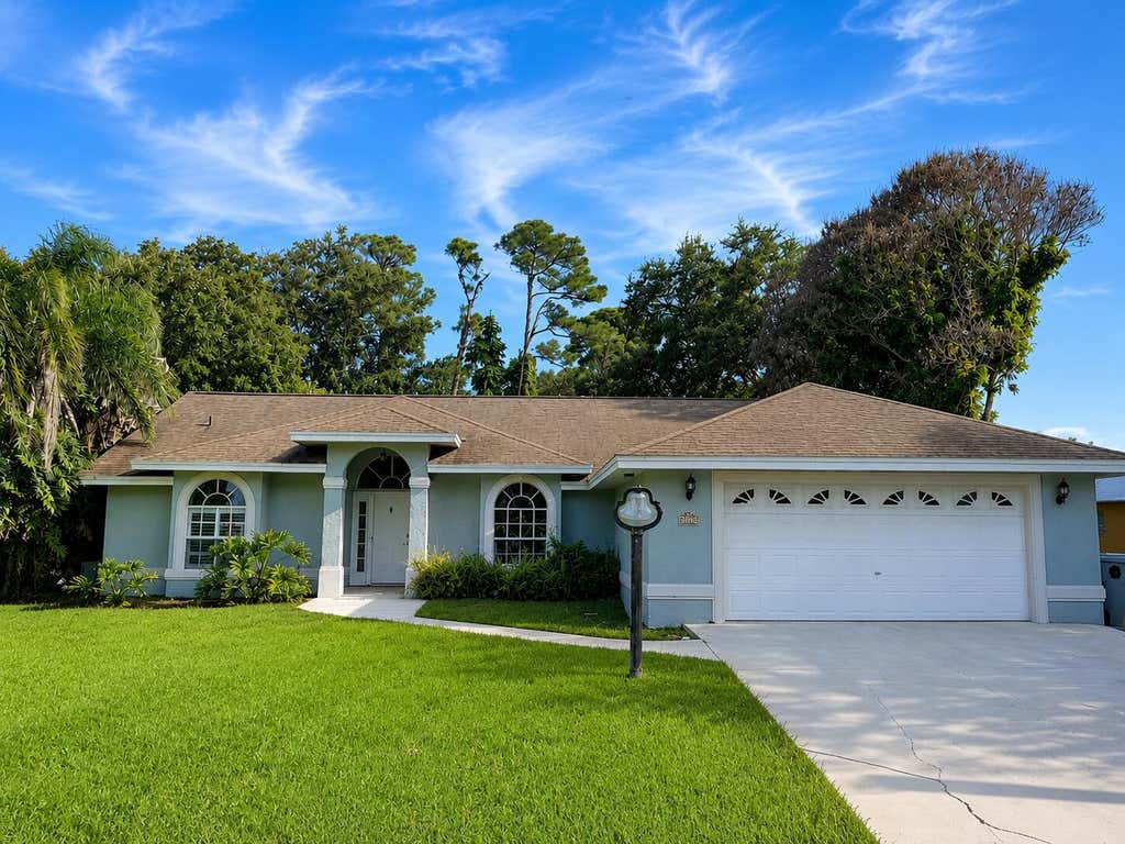 Photo of 4707 Paleo Pines Circle, Fort Pierce, FL 34951 (MLS # B26062687)