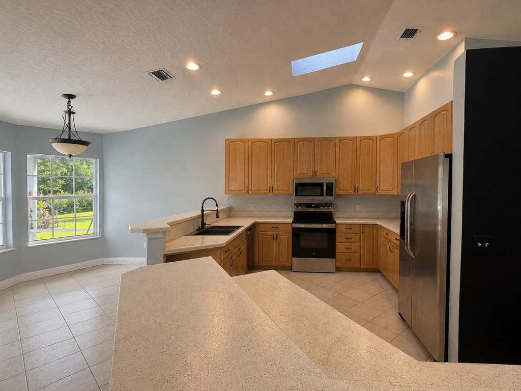 Photo of 4707 Paleo Pines Circle, Fort Pierce, FL 34951 (MLS # B26062687)
