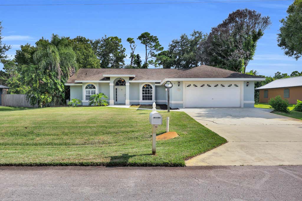 Photo of 4707 Paleo Pines Circle, Fort Pierce, FL 34951 (MLS # B26062687)