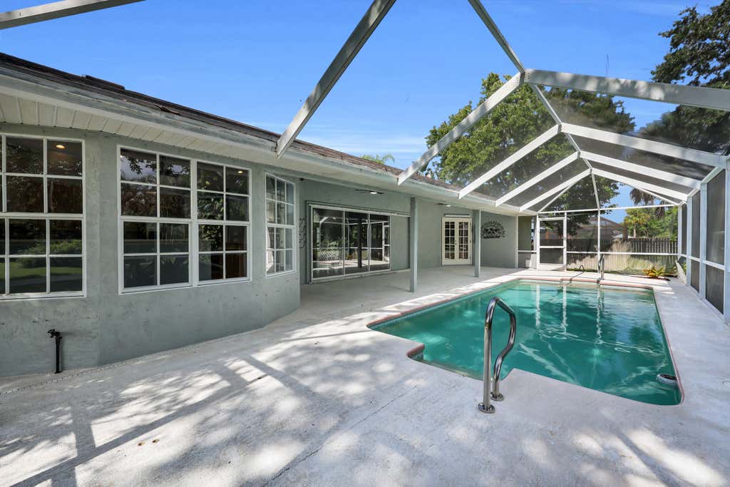 Photo of 4707 Paleo Pines Circle, Fort Pierce, FL 34951 (MLS # B26062687)