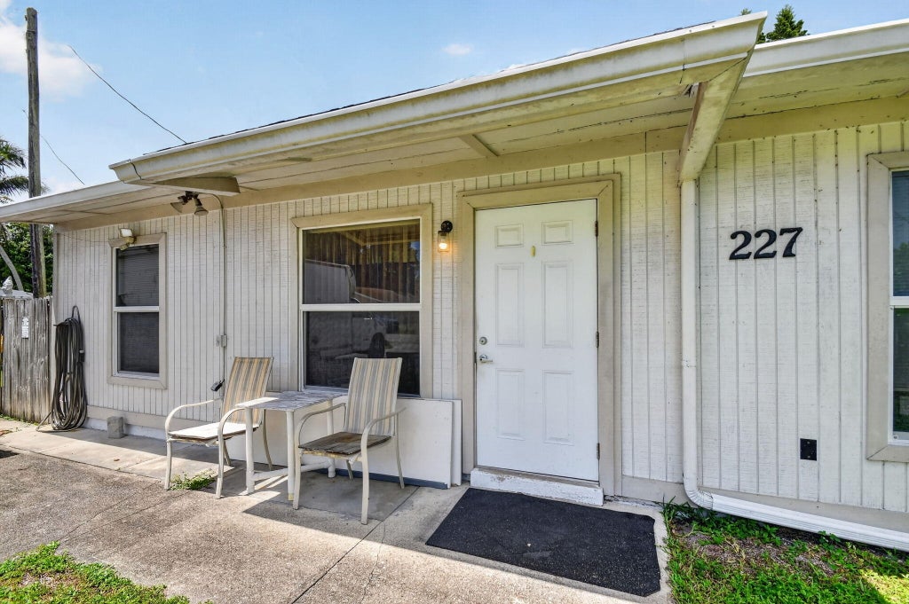 Photo of 207227 Ethelyn Drive, West Palm Beach, FL 33415 (MLS # B26069851)