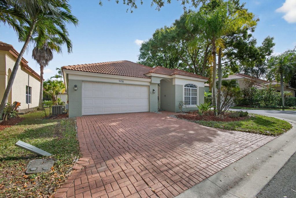 Photo of 5156 Elpine Way, Riviera Beach, FL 33418 (MLS # R11144457)
