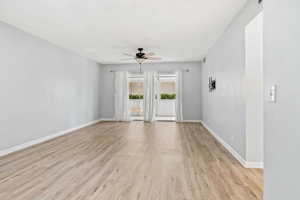 Photo of 12001 Poinciana Boulevard #102, Royal Palm Beach, FL 33411 (MLS # R11123006)