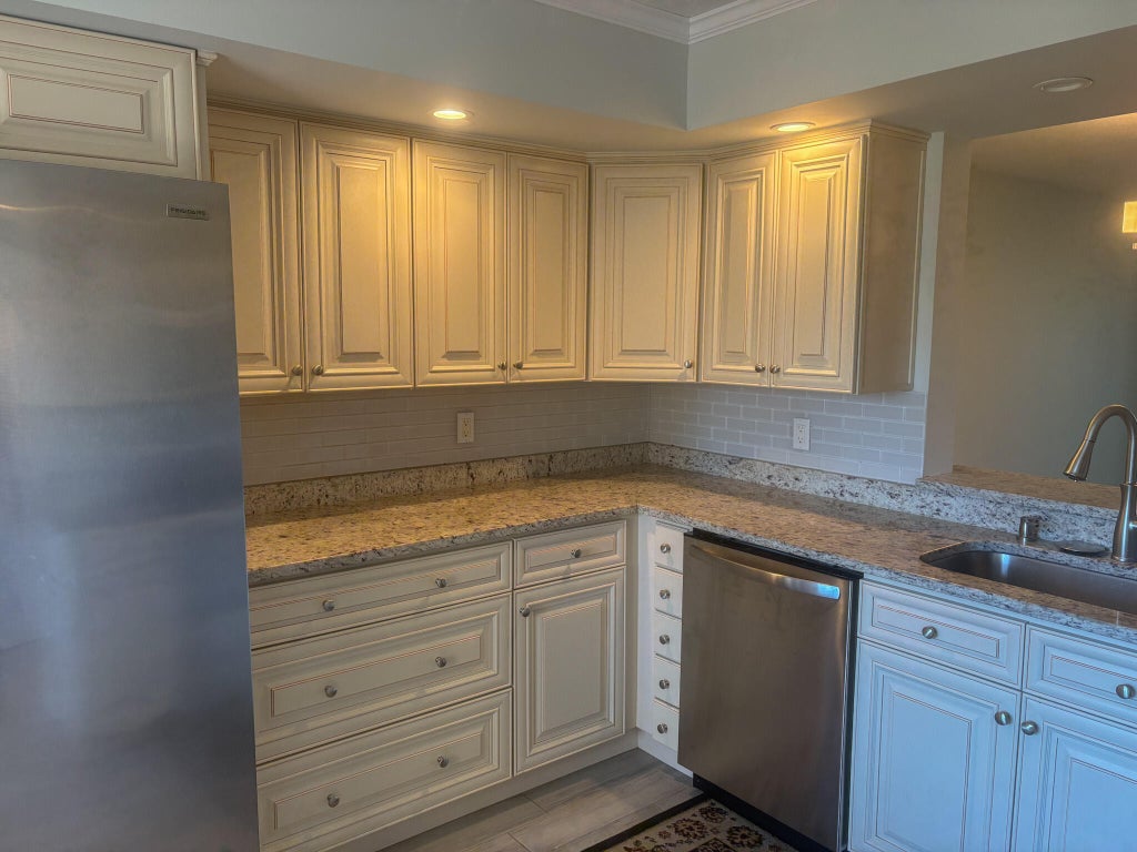 Photo of 6515 KENSINGTON Lane #304, Delray Beach, FL 33446 (MLS # B26073987)