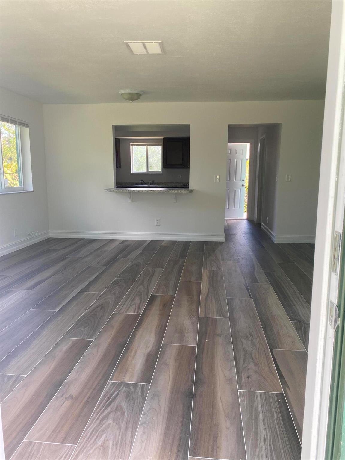 A very well-kept unit equipped with impact windows and freshly painted, tile floors throughout the home. The square footage is not verified.