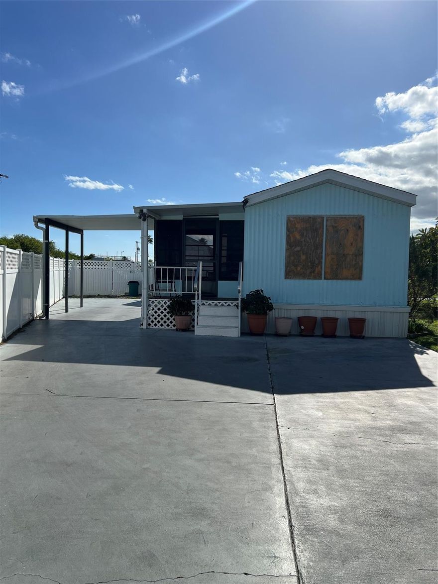 Discover your slice of paradise in the highly desirable Big O RV Resort, a gated 55+ community known for its friendly neighbors, resort-style amenities, and unbeatable location just minutes from Lake Okeechobee. This property is is situated on one of the largest lots in the Big O, offering extra space and privacy-a rare find in this community! Features: 2 Bedrooms, 1 Bath- Cozy, with a screened-in porch-perfect for relaxing and enjoying Florida breezes. Spacious Covered Carport, Huge Patio Area. Workshop with washer & dryer included, Fenced yard. Gated Entry, Clubhouse with pool- Community Boat Ramp- easy access to world-famous fishing on Lake Okeechobee. Storage area for boats & trailers. Shopping & dining just minutes away. New Brighton Bay Casino- only 20 minutes away. Golf carts ok.