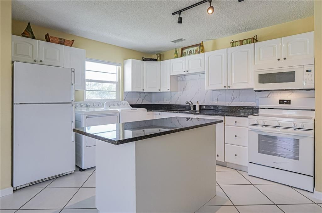 Photo of 11 Vista Palm Lane #203, Vero Beach, FL 32962 (MLS # R11157880)