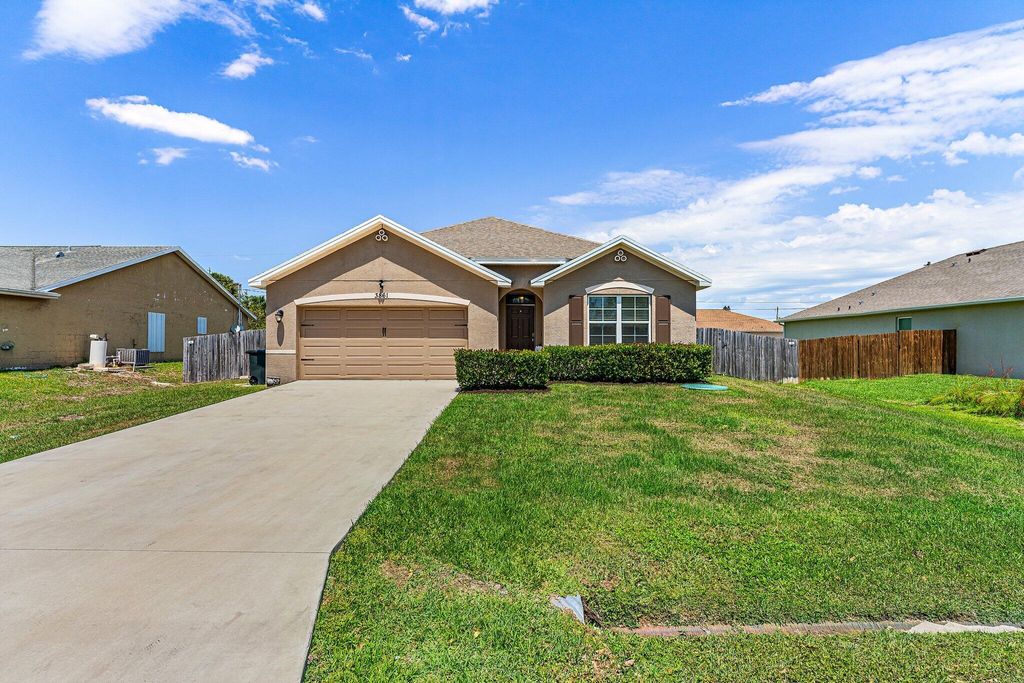 Photo of 3861 SW Kakopo Street St, Port St Lucie, FL 34953 (MLS # R10801052)
