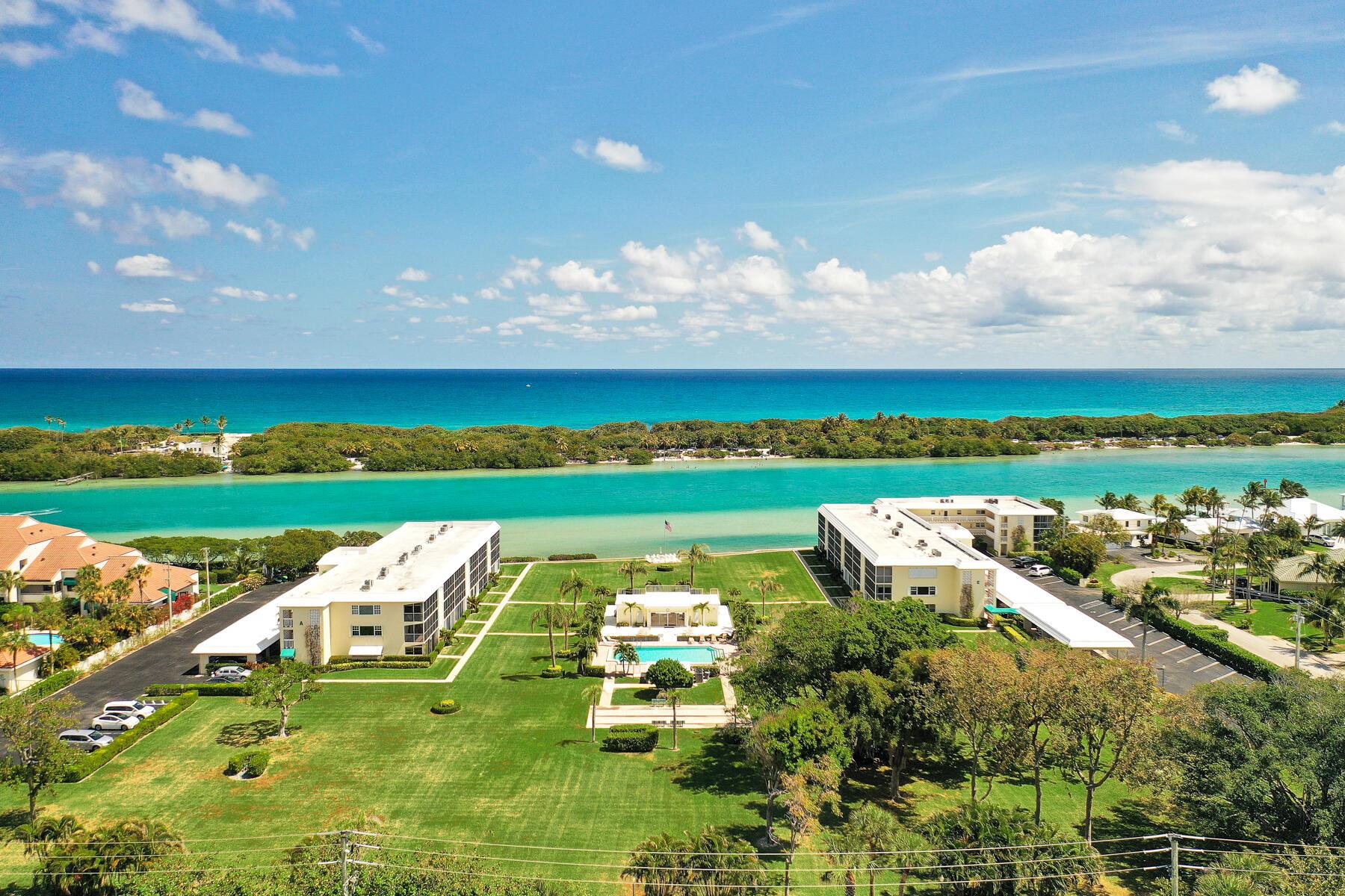 TURNKEY FURNISHED RENTAL AVAILABLE! Wow. UNBELIEVABLE FIND. CORNER UNIT! Situated on 5+ acres SMACK ON THE INTRACOASTAL, this Hidden Gem, is the definition of ''LIVING THE SOUTH FLORIDA LIFESTYLE''. Tastefully appointed. COVERED PARKING. View the action on the water and the sights and sounds of Mother Nature from the HUGE OVERSIZED PATIO. LOCATION LOCATION! Grab your KAYAK/PADDLEBOARD from the rack..walk right in the turquoise waters from the private stairs. The sandbar can be walked for miles at low tide. WALK/BIKE EVERYWHERE -Fantastic Restaurants, Shopping, Beaches, Parks, Pickleball, Churches, Jupiter Island, MALTZ Theatre. 3 MO MIN! Utilities capped. No Pets. RENTAL PRICE BASED ON TERM. OFF SEASON, SEASONAL OR ANNUAL. Price reflects an ANNUAL term. This is the find of the Century.
