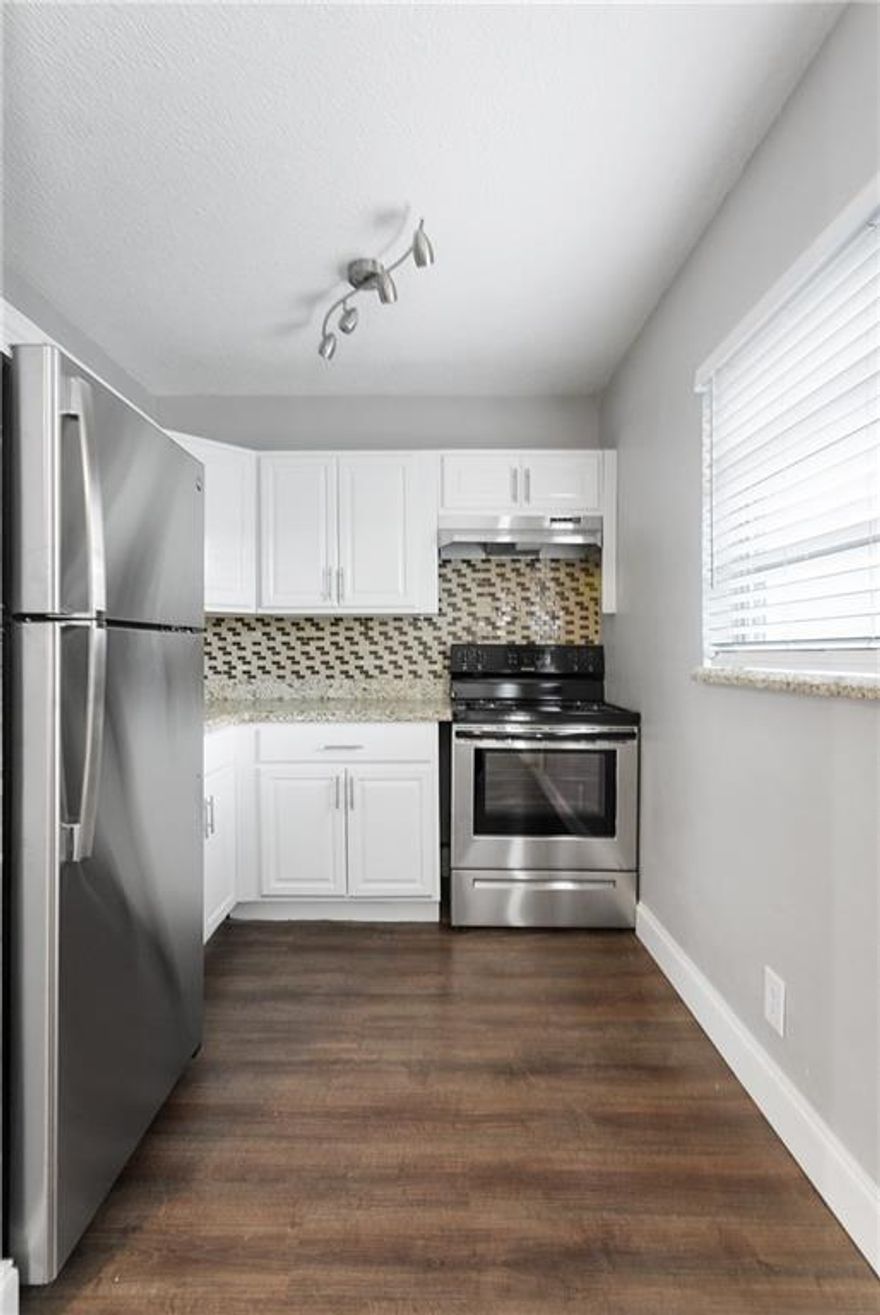 Completely updated must see 2 bed 1 bath , Residence features central air conditioning, open kitchen space with granite counter tops and tons of storage space. Tile throughout. Modern fixtures in every room. Rental price includes monthly water fee ,on site laundry. Located in hot riverside park ,minutes away from downtown Fort Lauderdale .