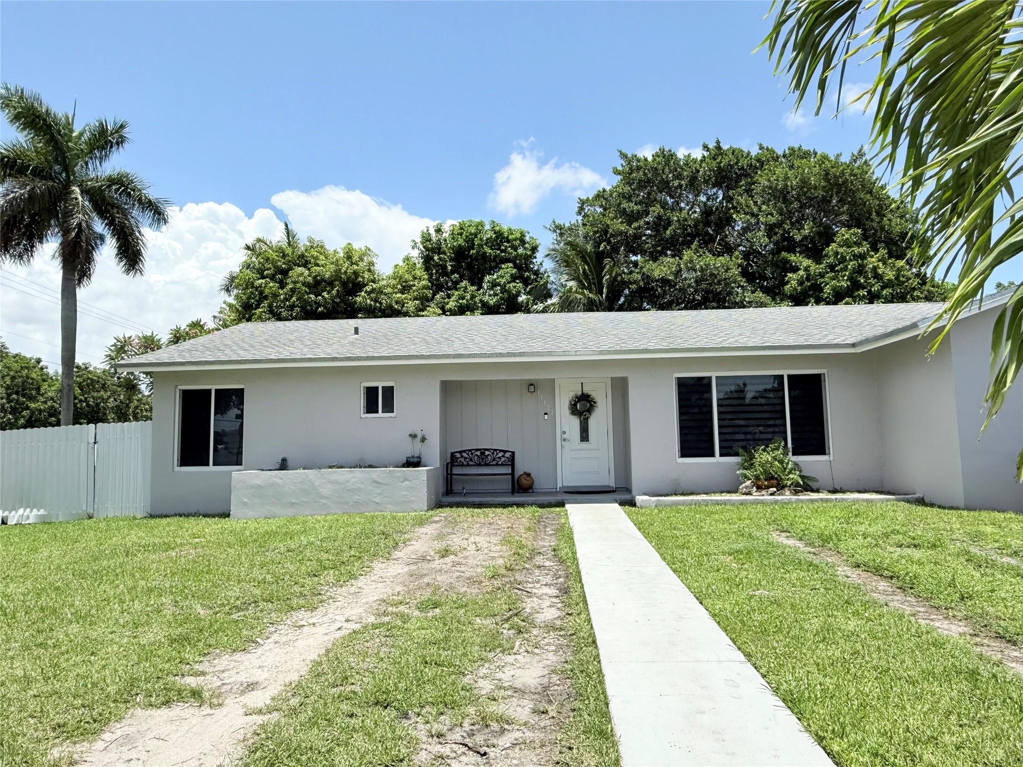 This charming single-family home featuring 3 bedrooms, 2 bathrooms, and a converted garage that serves perfectly as a 4th bedroom, home office, or flex space. Enjoy peace of mind with impact windows installed in 2020, a roof from 2019, and an AC system from 2016. Both bathrooms were stylishly updated in 2020 for a fresh, modern feel.
Situated on a desirable corner lot, the home offers a generous backyard with room to add a pool, and even includes a mature mango tree for your own tropical harvest. Located in a wonderful community, this home offers comfort, convenience, and great potential for outdoor living. Owners are very motivated. Don't miss out on this great home.