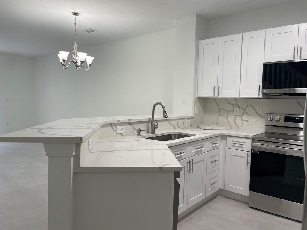 Photo of 5063 SE Mariner Garden Circle, Stuart, FL 34997 (MLS # R11006816)