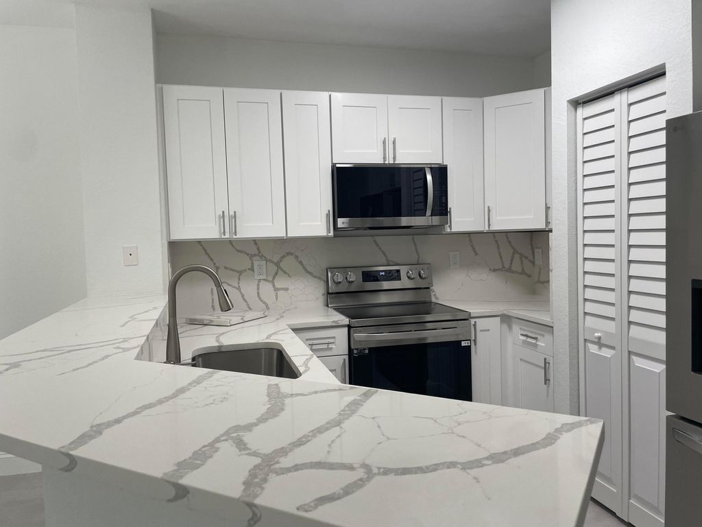 Photo of 5063 SE Mariner Garden Circle, Stuart, FL 34997 (MLS # R11006816)