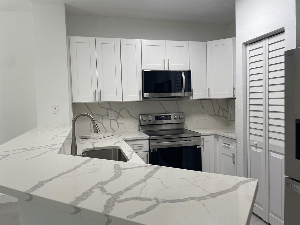 Photo of 5063 SE Mariner Garden Circle, Stuart, FL 34997 (MLS # R11006816)