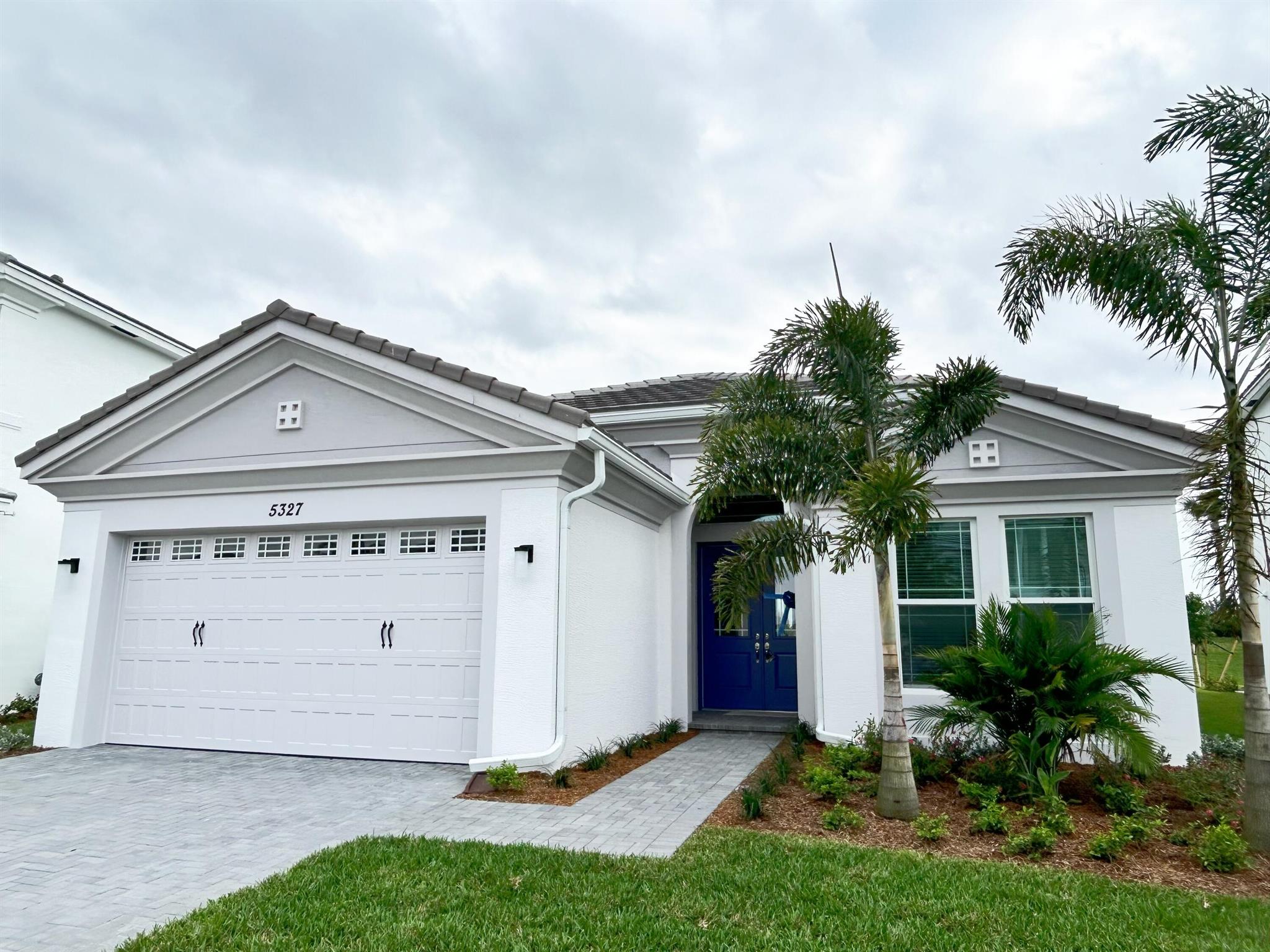 Absolutely stunning 3 bedroom, 3 full bath new construction home. Tile though all the house, all Impact windows. Live in a resort style Westlake community include a lagoon pool with 3 story slide, splash pad for little ones, cabanas, lawn space for parties, outdoor concert pavilion, basketball courts, adult pool and multi-purpose building, playground, dog park, pump park for BMX enthusiasts and much more. 30 minute drive to the ocean. Close to West Palm Beach airport. A-rated schools assigned. Lots of shops , restaurant