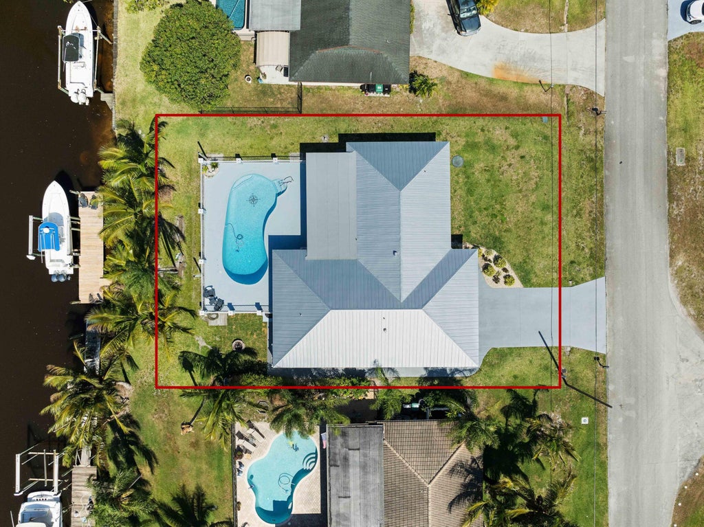 Photo of 641 SE Whitmore Drive, Port Saint Lucie, FL 34984 (MLS # R11081910)