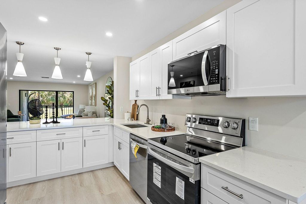 Photo of 52 Stratford Lane #F, Boynton Beach, FL 33436 (MLS # R11113962)