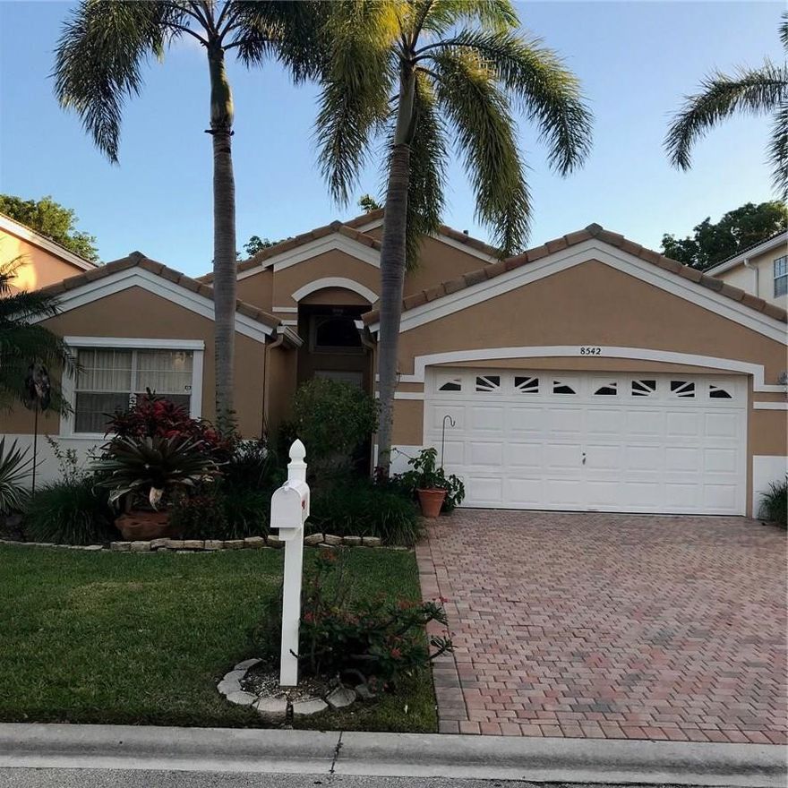 LOVELY HOME IN GATED COMMUNITY. CENTRALLY LOCATED, SPLIT BEDROOMS.  COMPLETELY REMODELED KITCHEN WITH GRANITE, WOOD CABINETS & STAINLESS STEEL APPLIANCES.  FENCED BACKYARD WITH A LARGE EXTENDED SCREENED IN PATIO WITH PAVERS. FRESHLY PAINTED EXTERIOR, ACCORDION & HURRICANE SHUTTERS. BUILT IN CABINETS IN GARAGE. NEWER A/C. LOW HOA FEES. GREAT SCHOOLS!! BRICK PAVER DRIVEWAY.