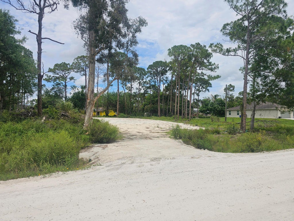 Photo of 13841 76th Road N, The Acreage, FL 33412 (MLS # B26039158)